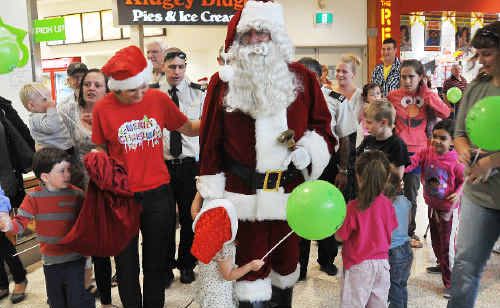 Santa arrives at Park Beach Plaza. Santa arrives at Park Beach Plaza.